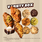A variety of baked goods including croissants, cookies, and brownies, a 'Variety Box' for dessert options.